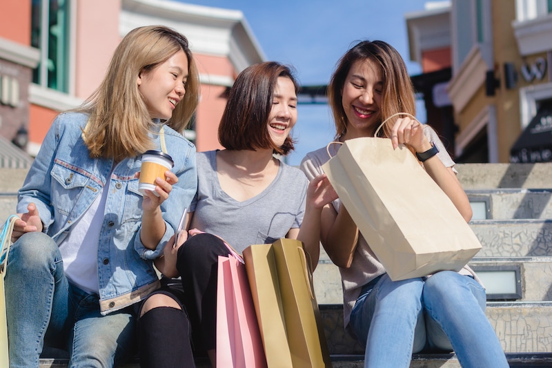 Blog 6 asian woman shopping in an outdoor market with sho 2021 09 03 16 14 00 utc